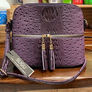 Brand new purple sugu purse.  Faux ostrich.